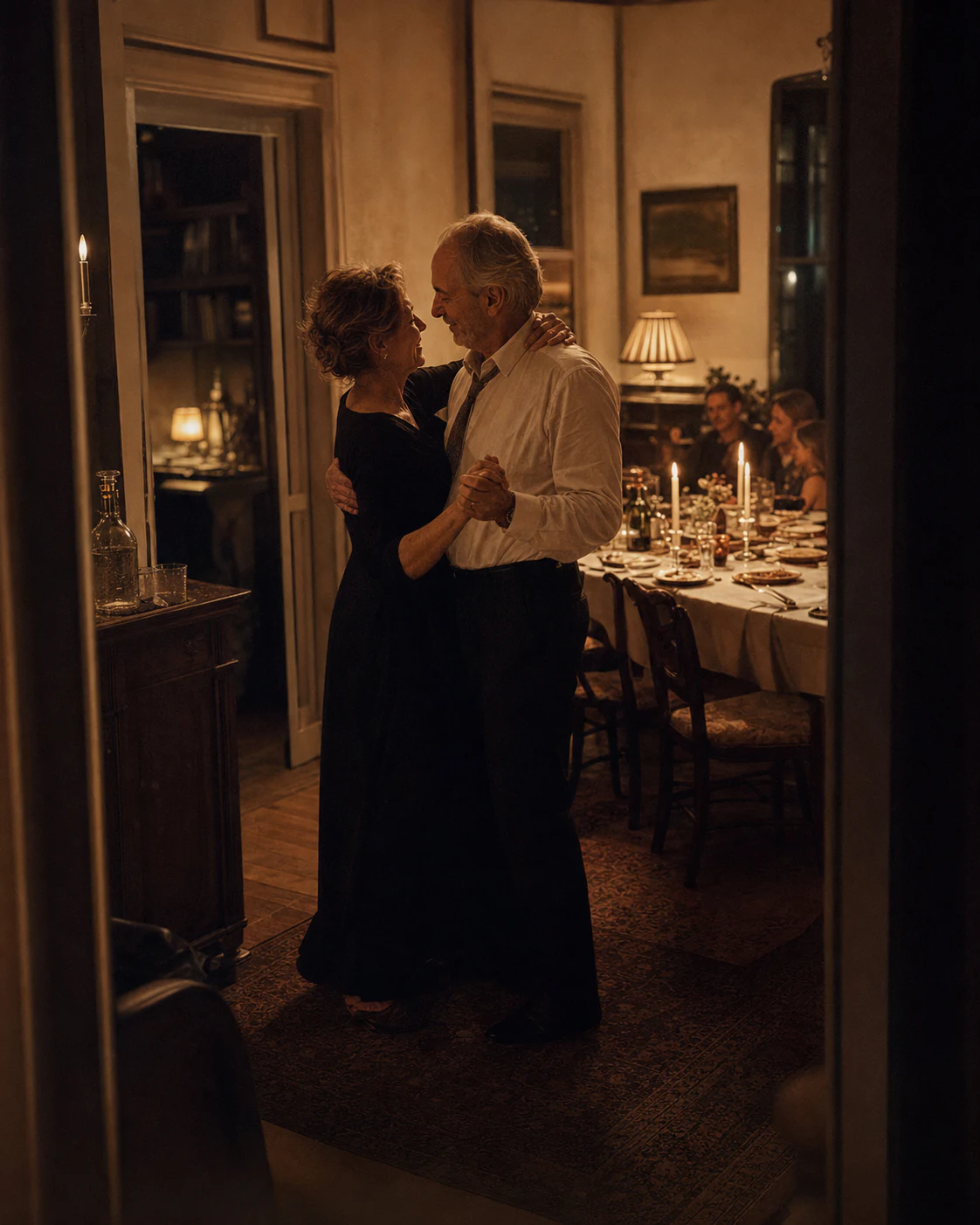 An older couple dancing after an anniversary dinner